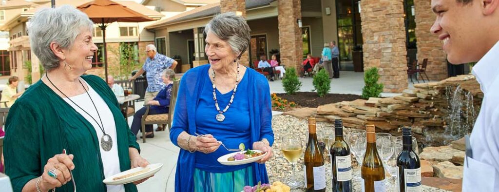 senior women enjoying an outdoor event