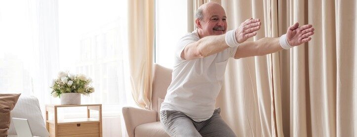 senior man doing chair pose