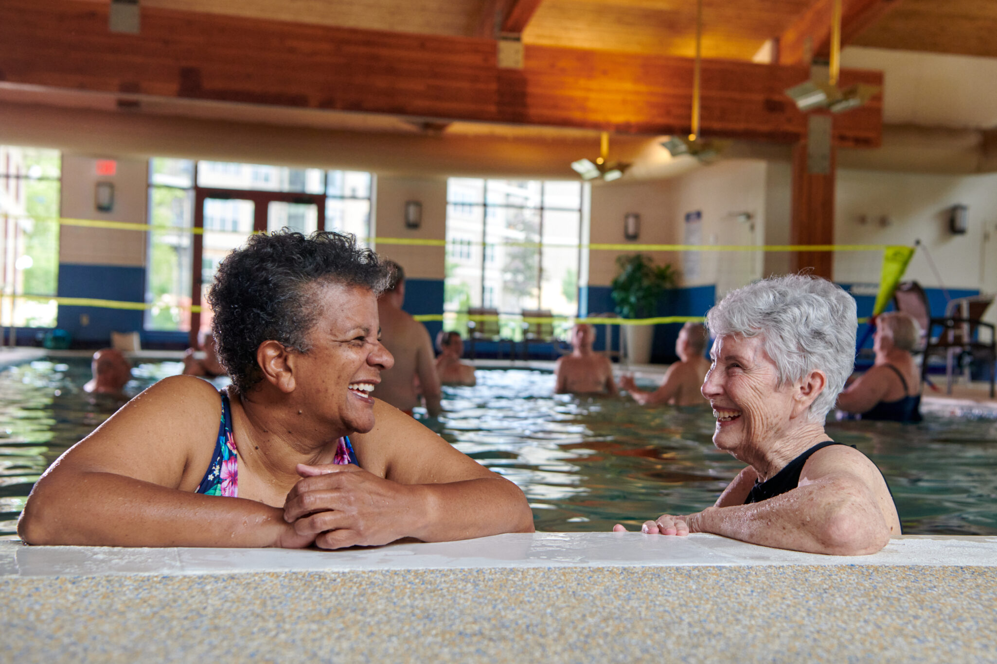two senior women in john knox village pool