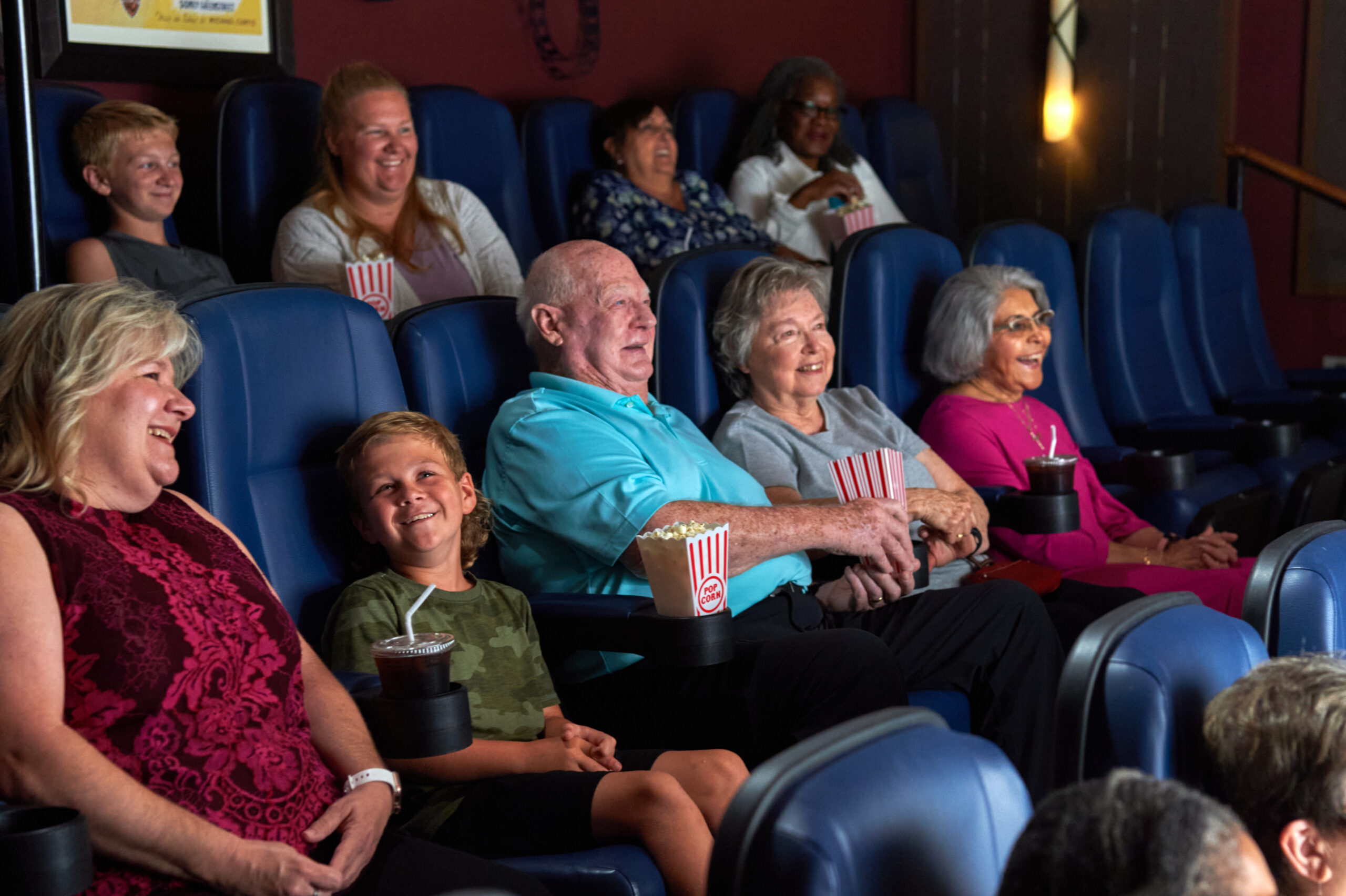 John Knox Village residents watching a movie in the senior living community's on-site theater