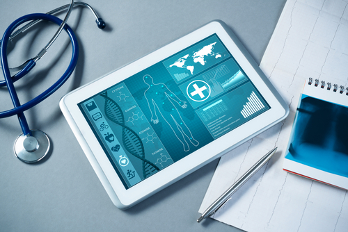 White,Tablet,Pc,And,Doctor,Tools,On,Gray,Surface health-screenings